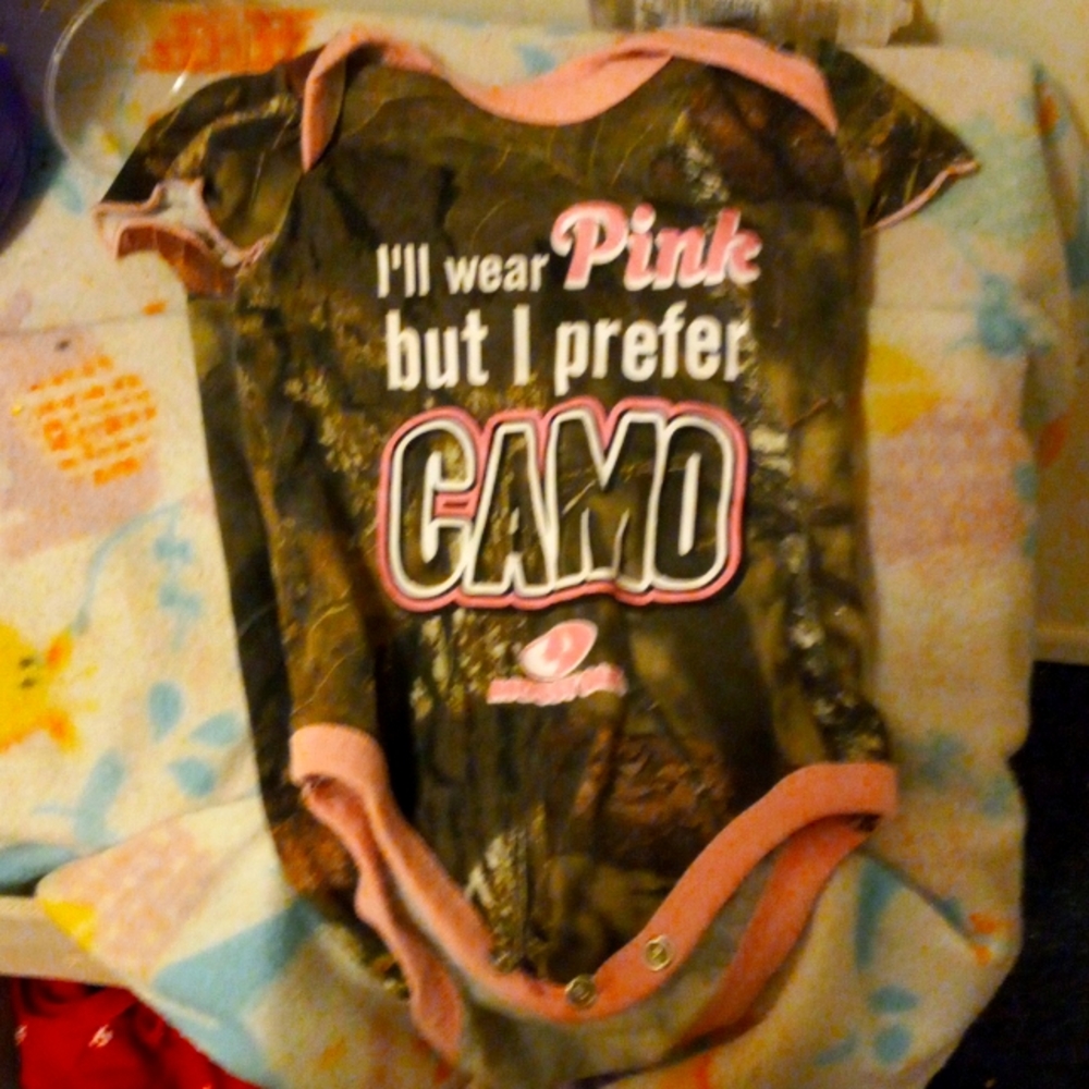 I am selling a baby shirt for a girl